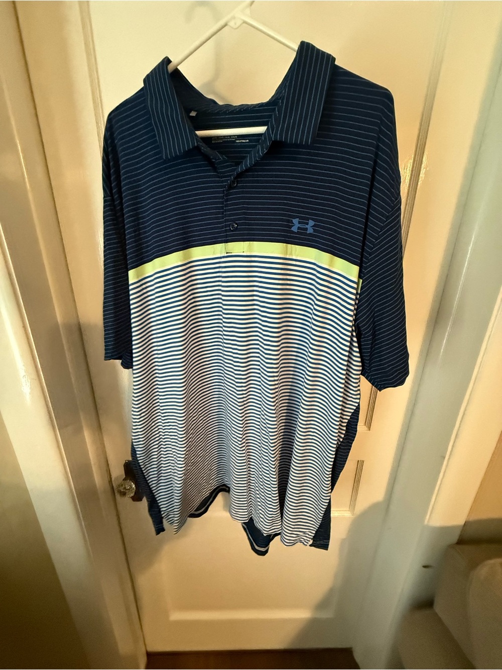 Under Armour Men's Navy and White Striped Polo with Yellow Chest Stripe